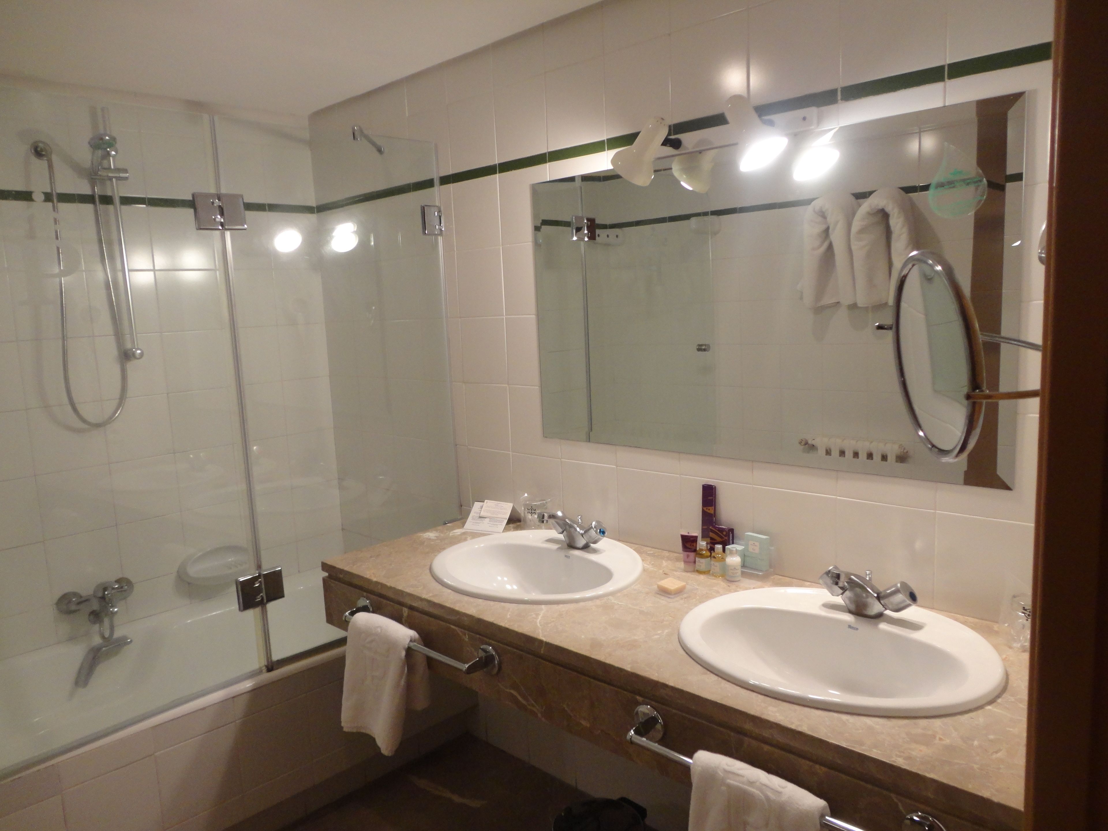 combined shower/bathtub, deep-soaking bathtub, eco-friendly toiletries