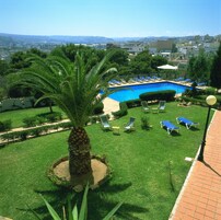 Seasonal outdoor pool, open 4:30 PM to 8:30 PM, pool umbrellas