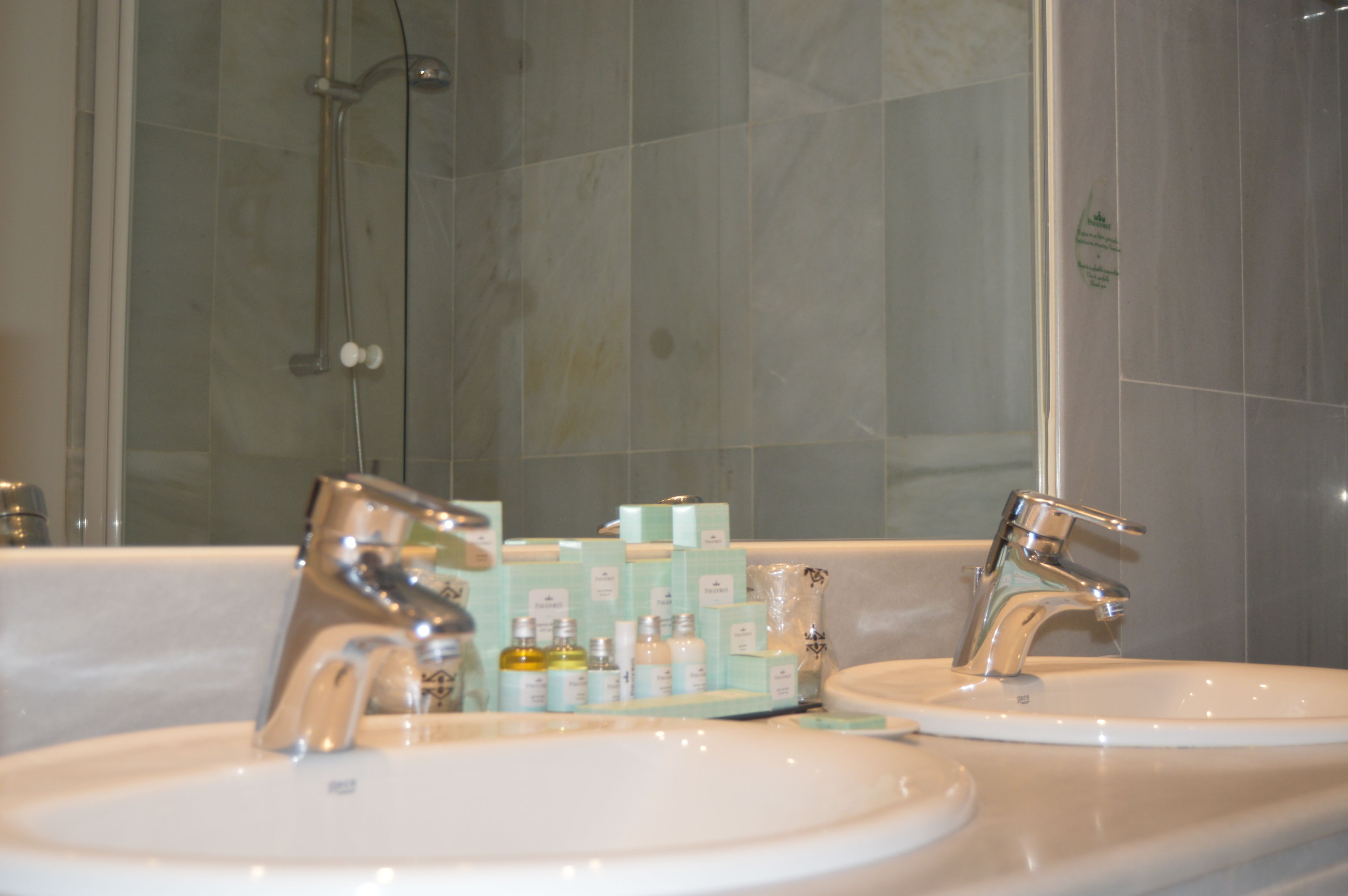 eco-friendly toiletries, hair dryer, towels