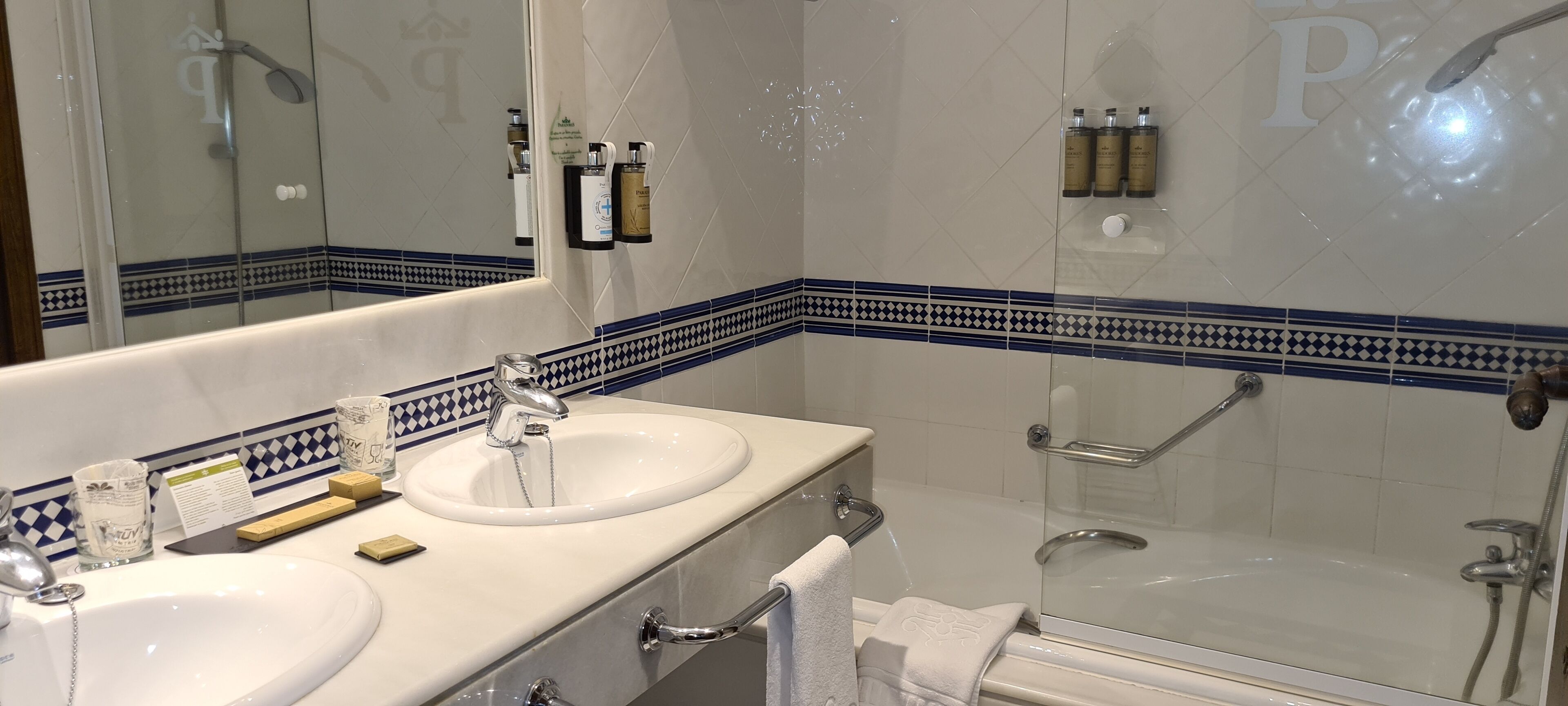 eco-friendly toiletries, hair dryer, towels