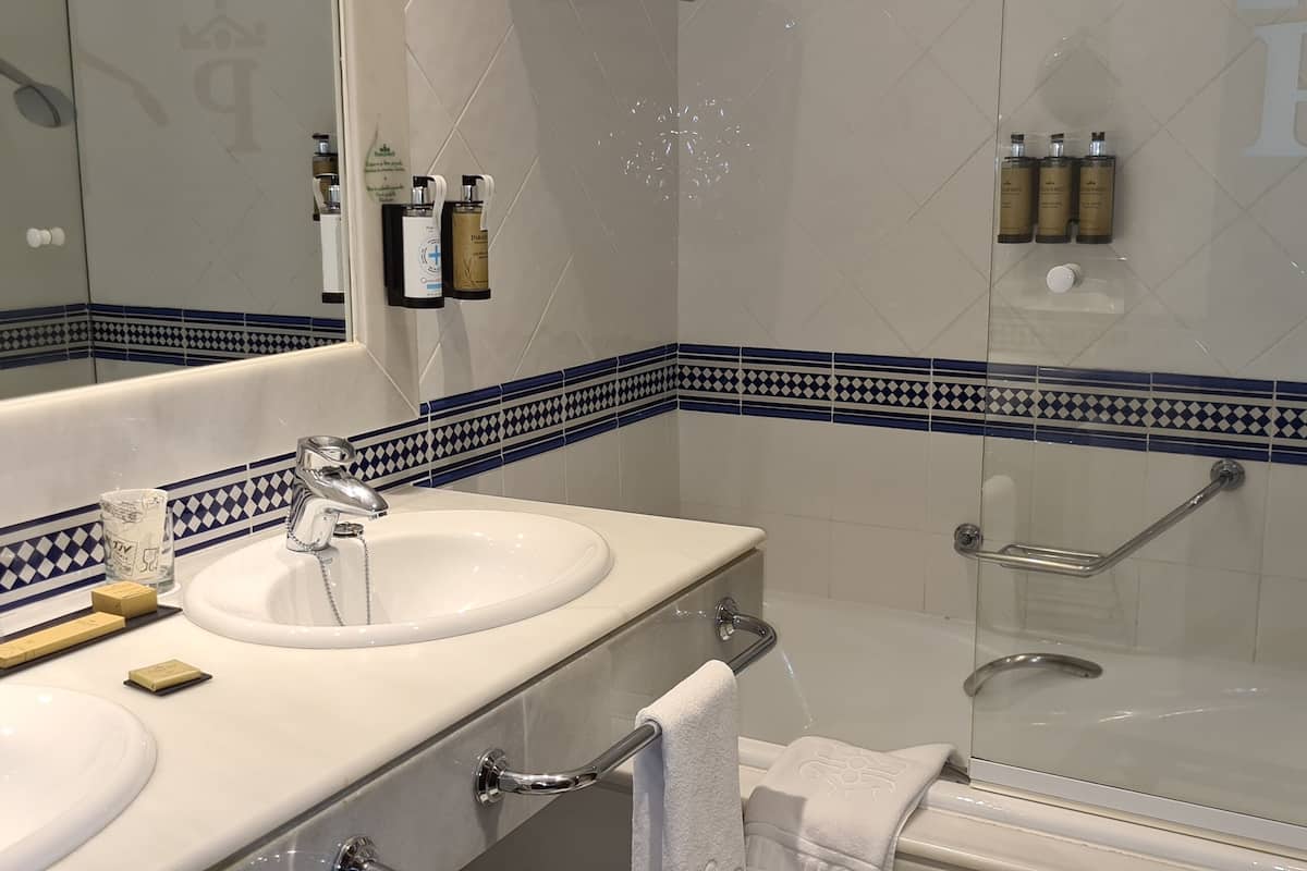 eco-friendly toiletries, hair dryer, towels
