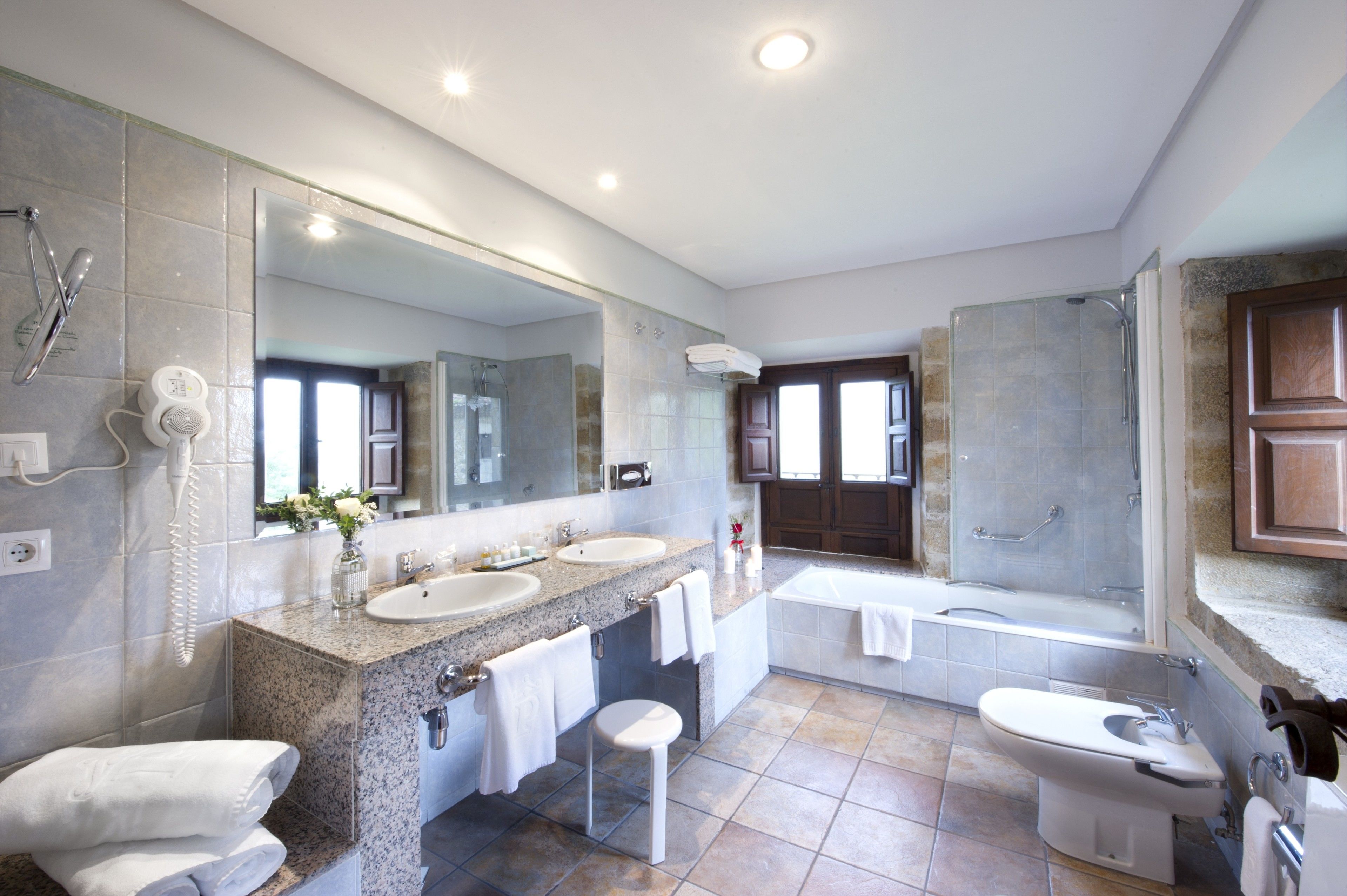 bathtub, free toiletries, hair dryer, bidet