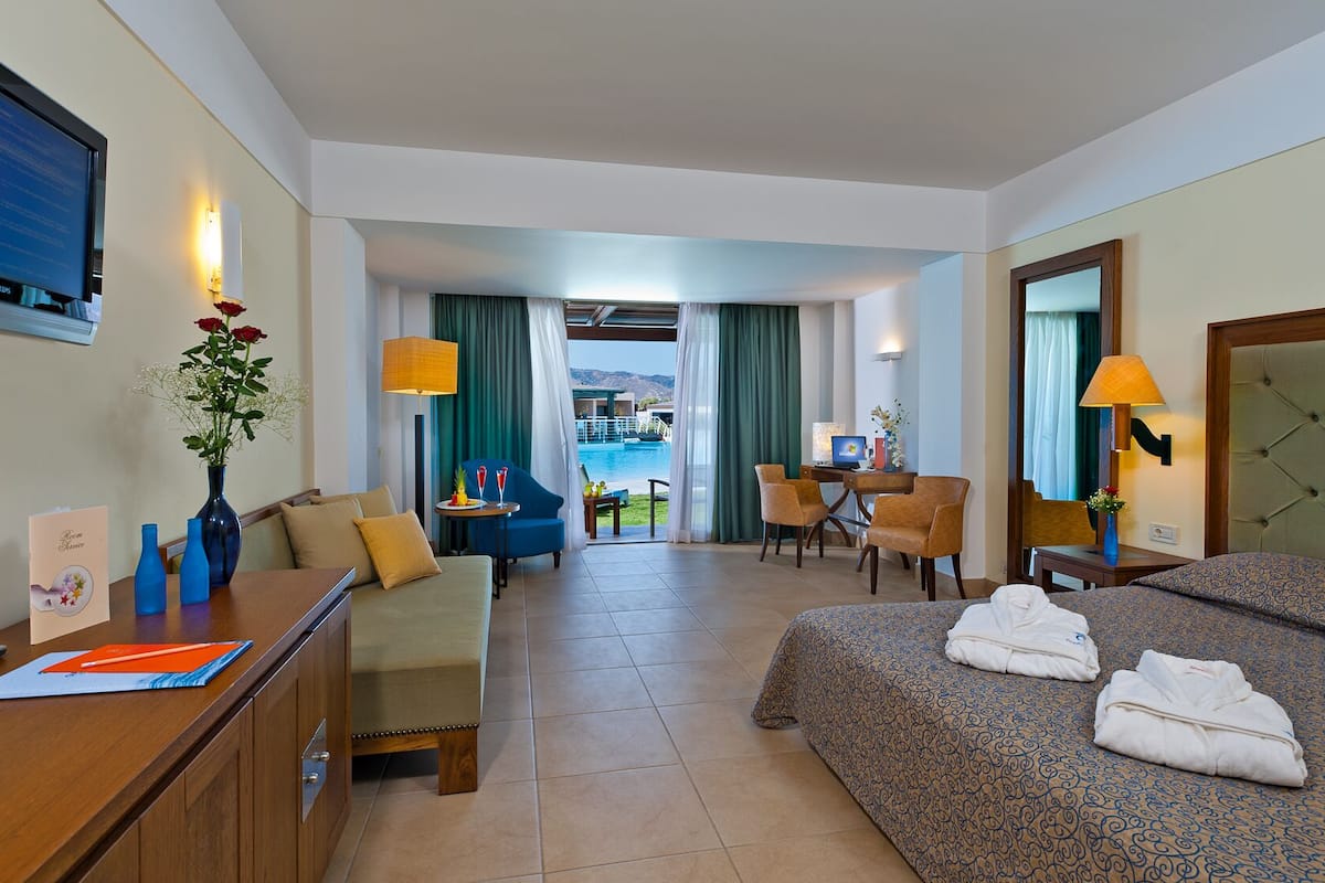junior suite pool access | 1 bedroom, premium bedding, minibar, desk