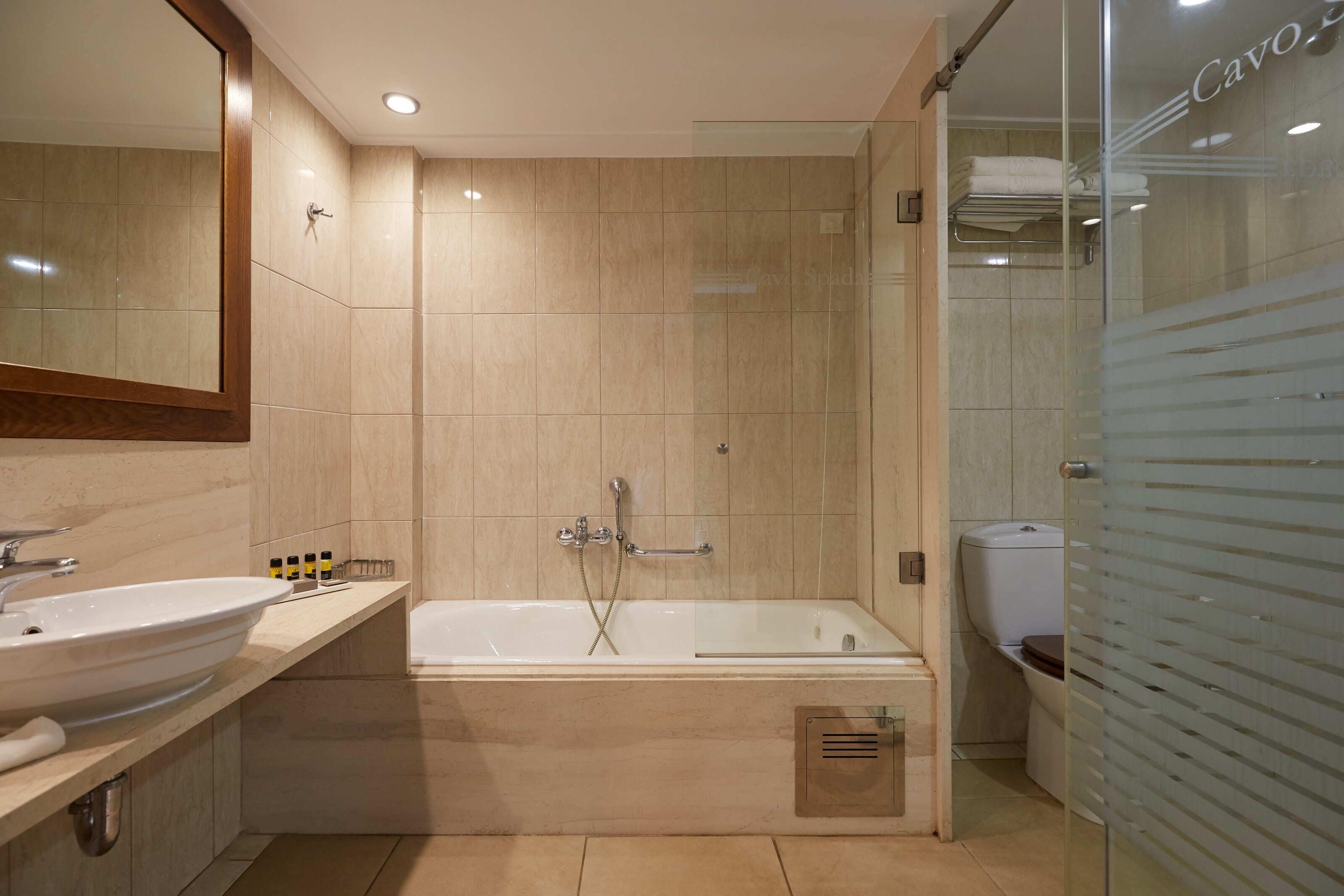 separate bathtub and shower, deep-soaking bathtub, rainfall showerhead