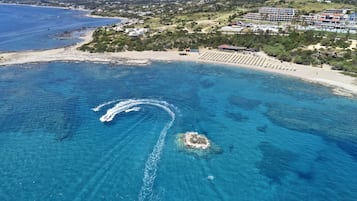 Private beach nearby, beach towels, beach bar