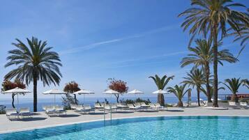 Indoor pool, outdoor pool, pool umbrellas, sun loungers