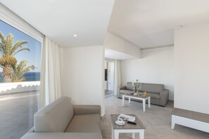 Executive Suite, Sea View | Living area | Flat-screen TV
