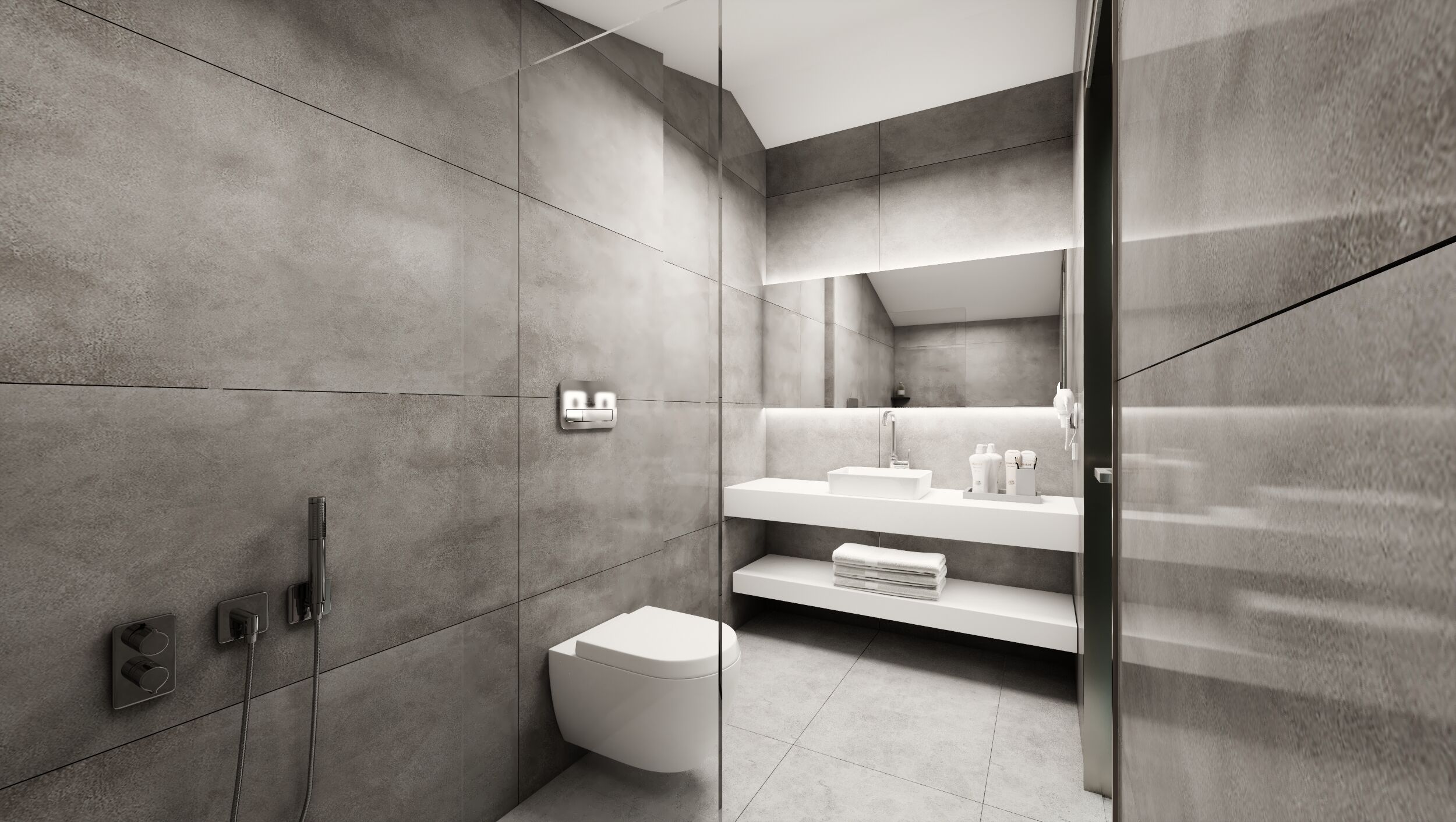 Ein modernes Badezimmer mit bodengleicher Dusche, Toilette und Waschtisch mit Spiegel.
