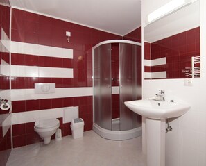 Shower, free toiletries, hair dryer, towels