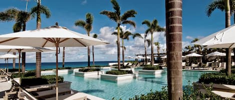 3 outdoor pools, cabanas (surcharge), pool umbrellas