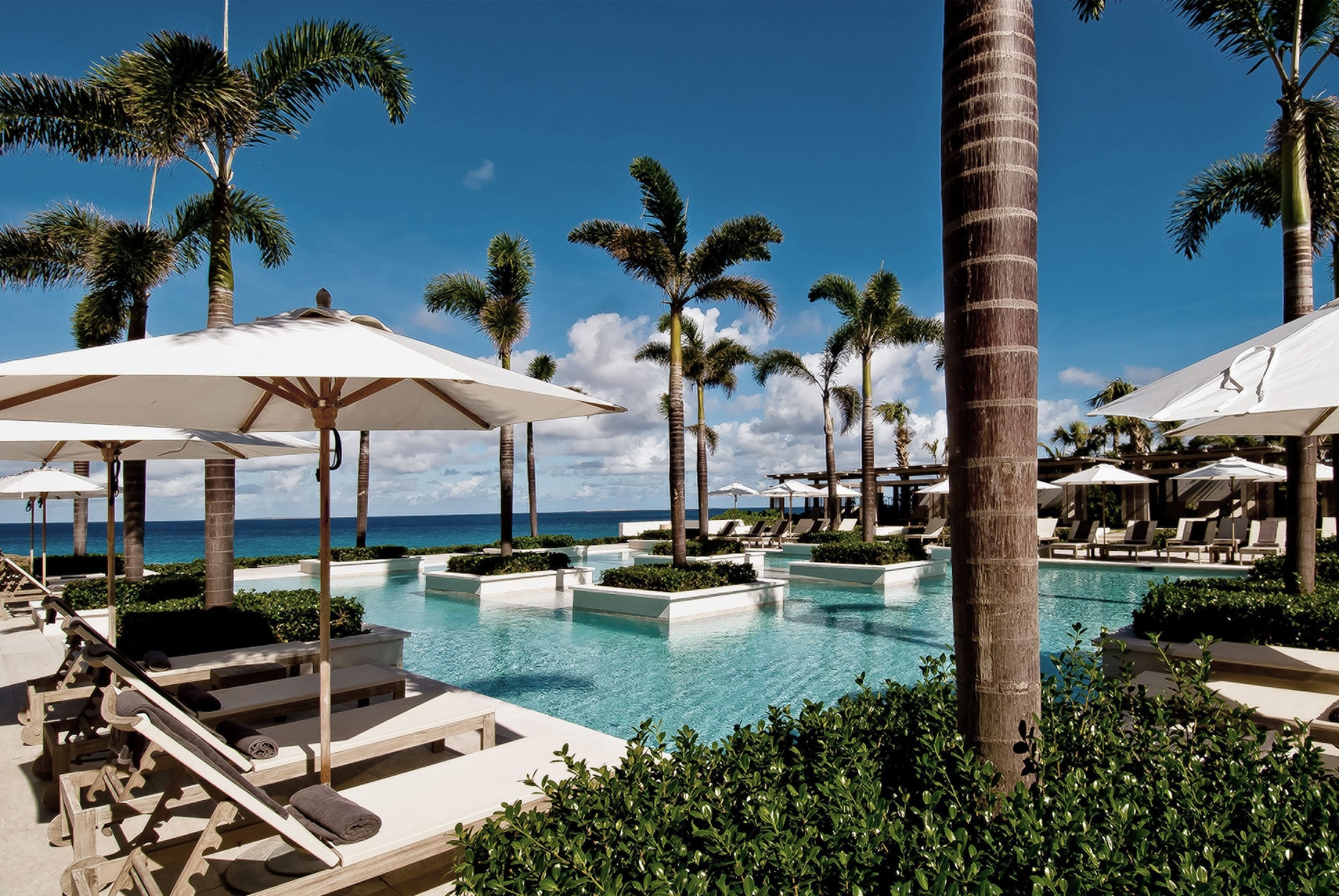 3 outdoor pools, cabanas (surcharge), pool umbrellas