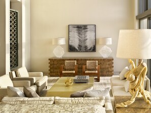 Flat-screen TV, DVD player, pay movies