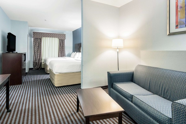 Pillowtop beds, desk, laptop workspace, WiFi (free)
