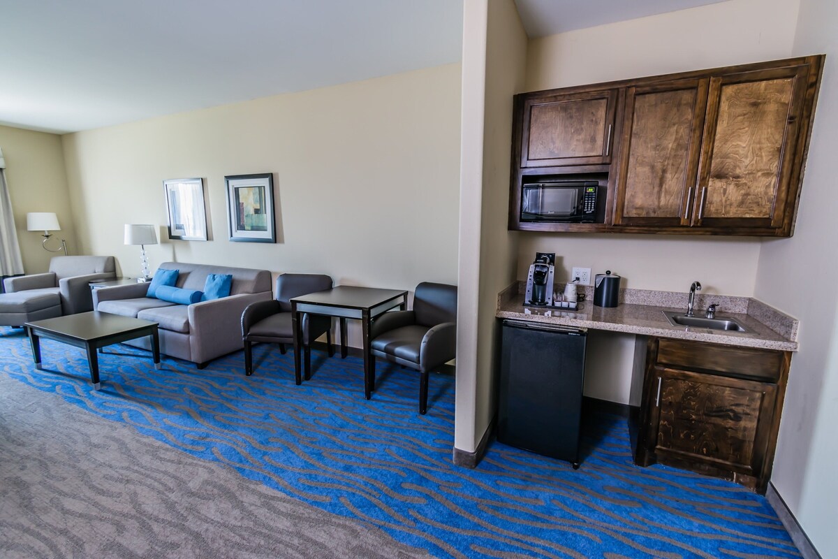 Suite, 1 King Bed with Sofa bed (Additional Living Area) | Desk, iron/ironing board, cribs (free), rollaway beds (surcharge)
