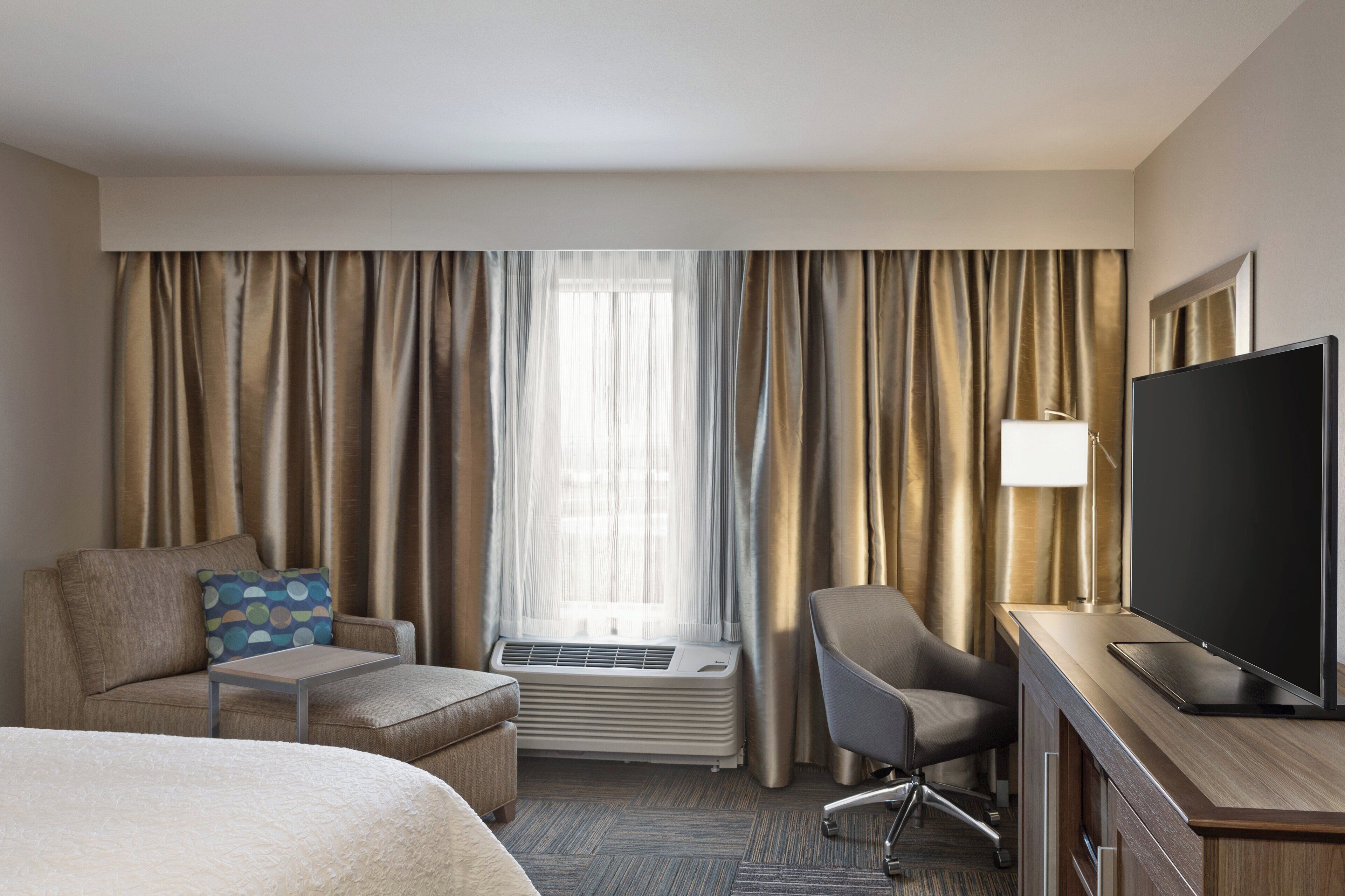 room, 1 king bed, non smoking | in-room safe, desk, laptop workspace, rollaway beds