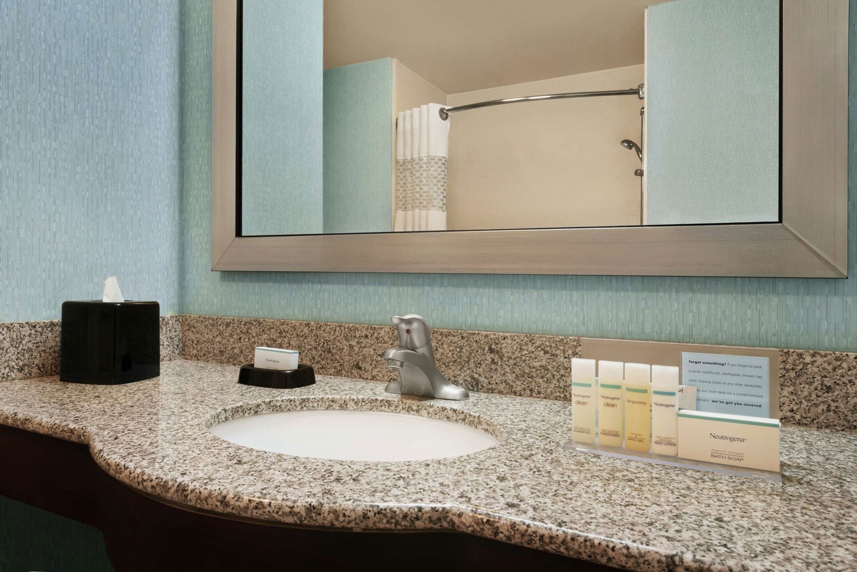 Bathroom | Designer toiletries, hair dryer, towels, soap