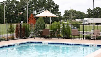 Outdoor pool, open 9 AM to 10 PM, sun loungers