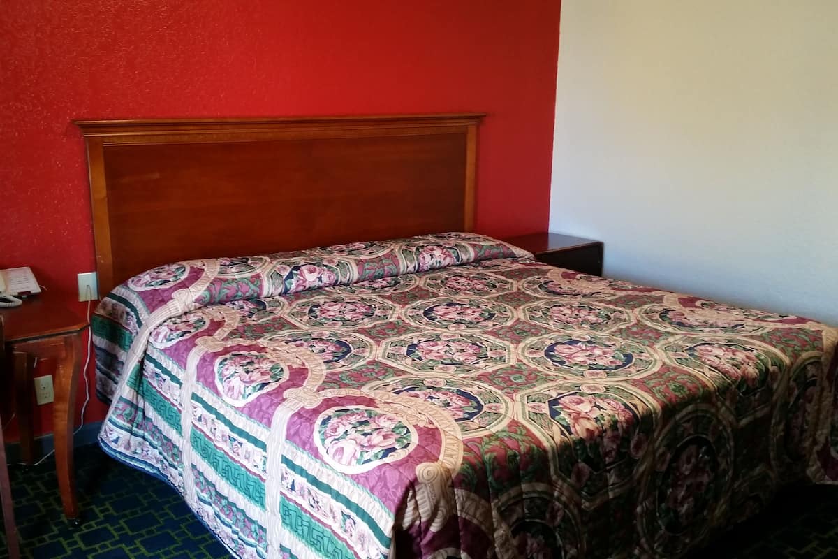 Desk, blackout drapes, WiFi (free), bed sheets