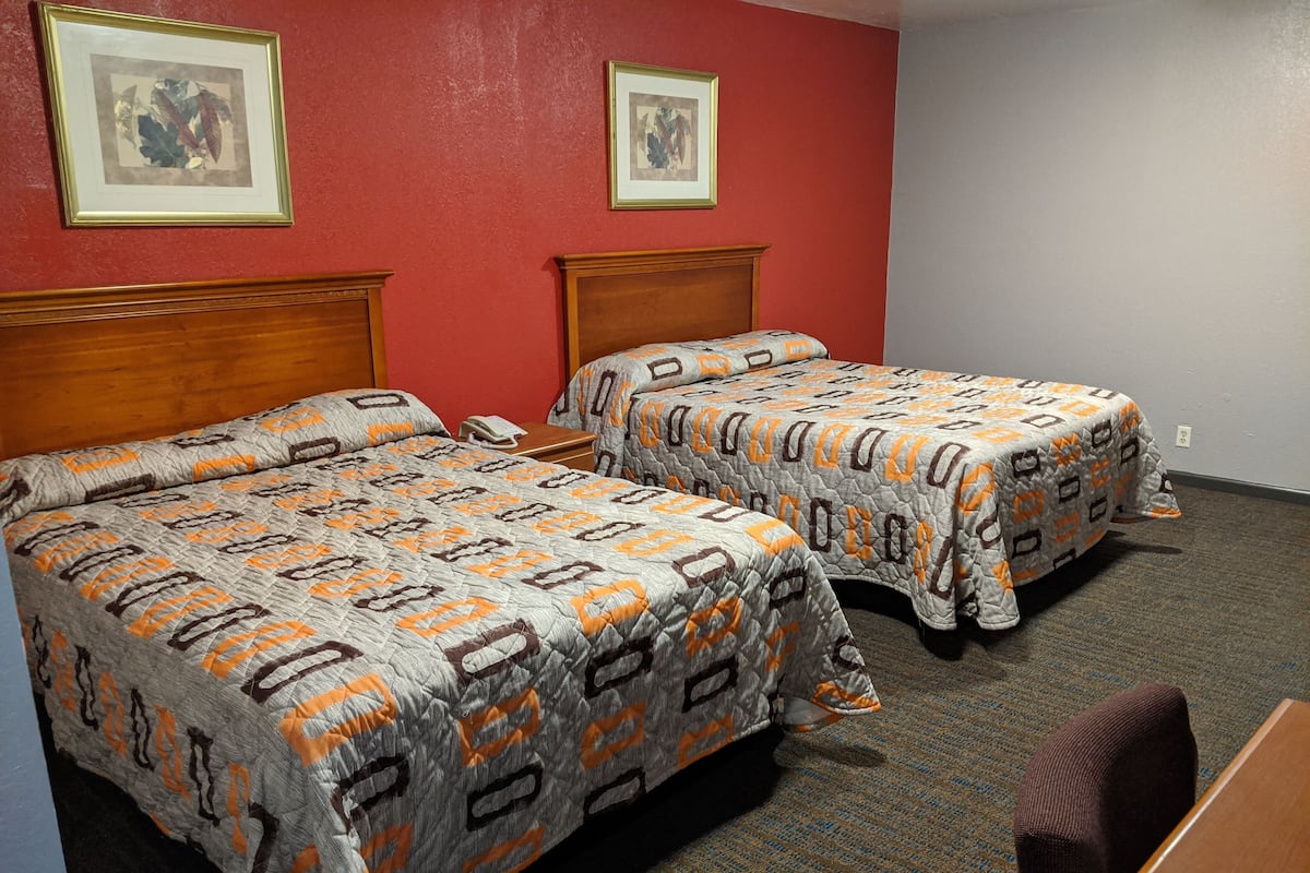 Desk, blackout drapes, WiFi (free), bed sheets