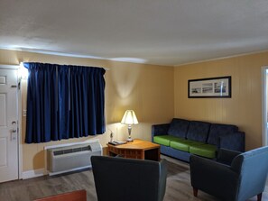 32-inch flat-screen TV with cable channels, TV - Colonial Inn Motel (Nags Head)