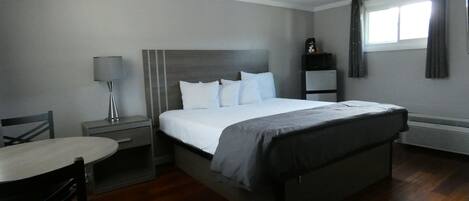 Standard Room, 1 King Bed | Down comforters, iron/ironing board (on request), WiFi (free)