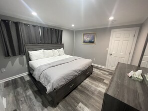 Standard Apartment | Down comforters, individually furnished, desk, laptop workspace