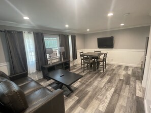 Standard Apartment | Living area | Flat-screen TV