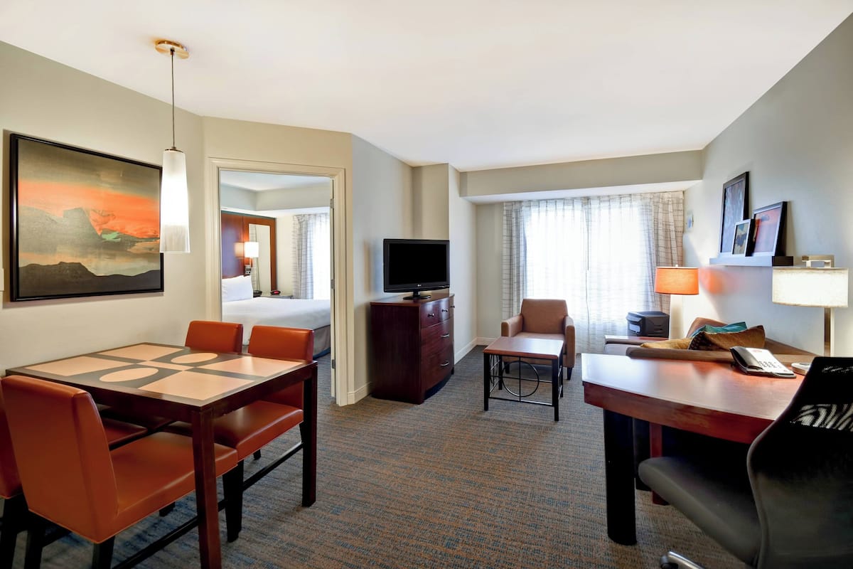 Suite, 2 Bedrooms (Pure) | Living room | 37-inch flat-screen TV with cable channels, TV