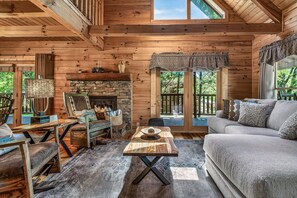 Cabin, 2 Bedrooms | Living area | 48-inch LCD TV with cable channels, TV - RiverStone Condo Resort & Spa (Pigeon Forge)
