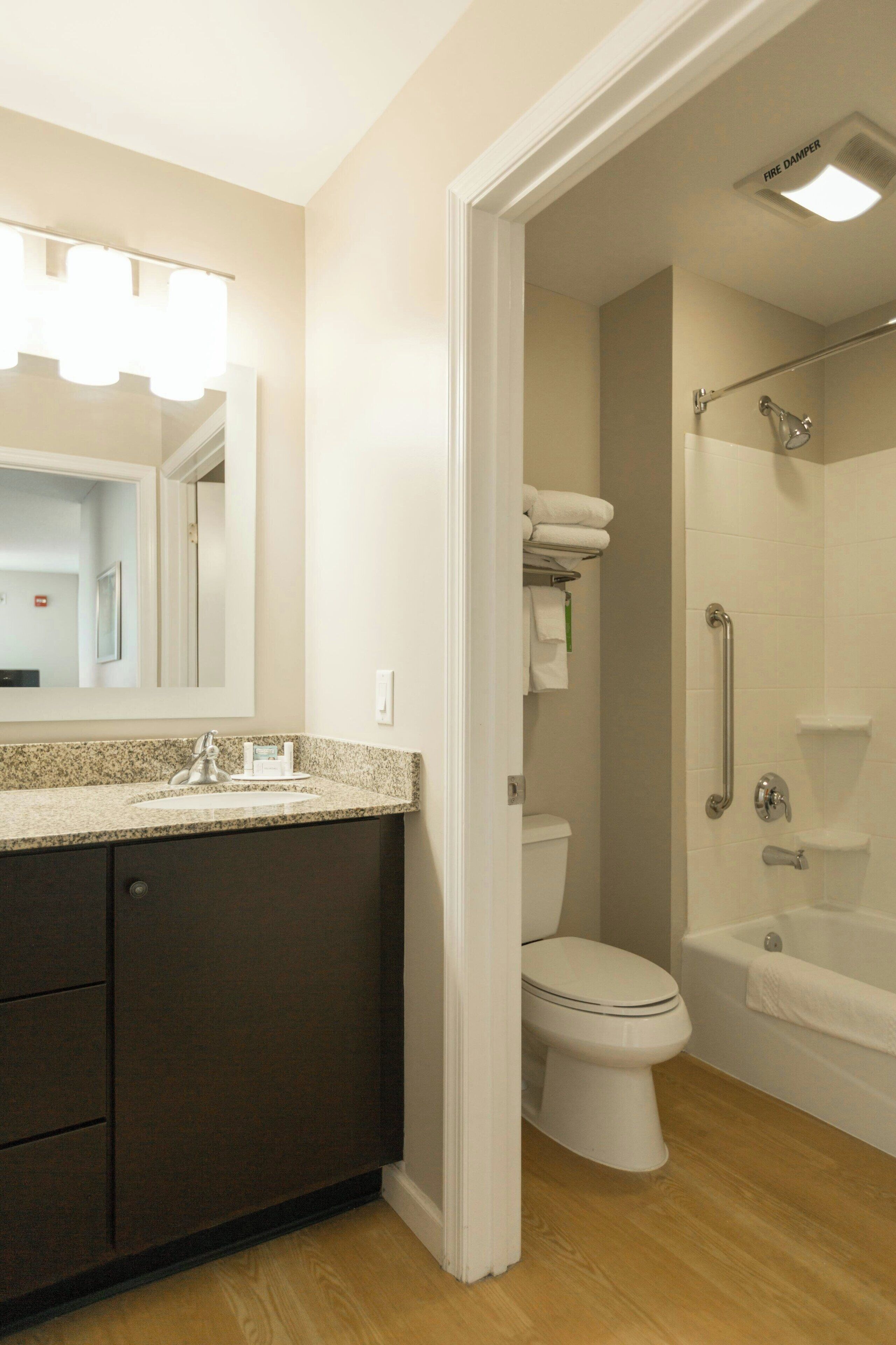 suite, 2 bedrooms | bathroom | combined shower/bathtub, hair dryer, towels