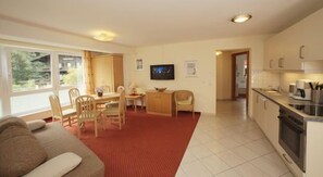 Apartment, 2 Bedrooms, Balcony, Mountain View | Living area | 80-inch flat-screen TV with cable channels, TV - Appartements Furstauer (Saalbach-Hinterglemm)
