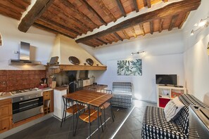 Standard Apartment, 1 Bedroom, Garden View | Living area | Flat-screen TV