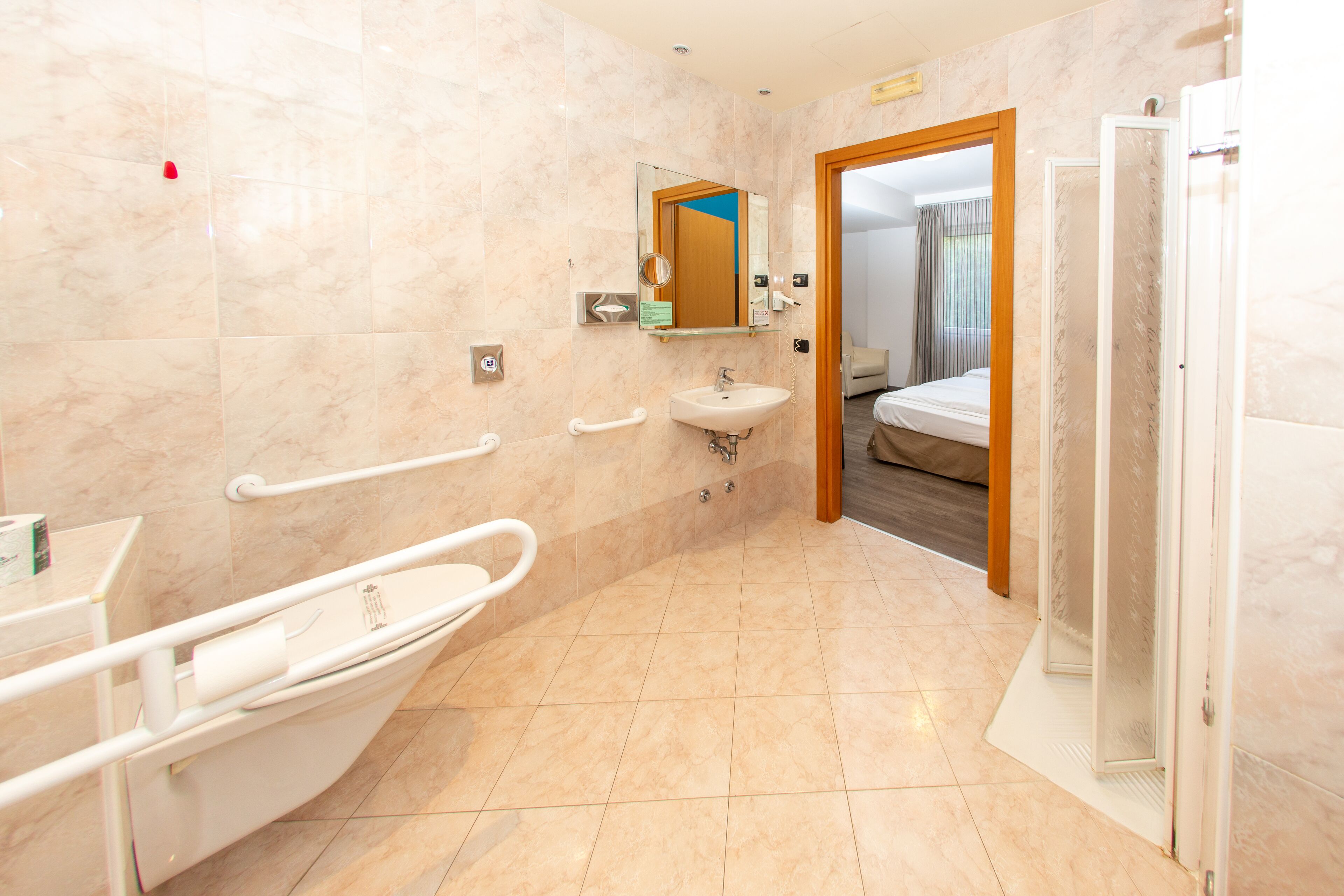 standard quadruple room | bathroom | shower, rainfall showerhead, hair dryer, slippers