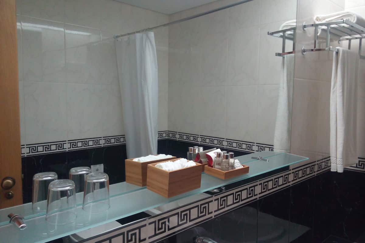 combined shower/bathtub, free toiletries, hair dryer, bathrobes