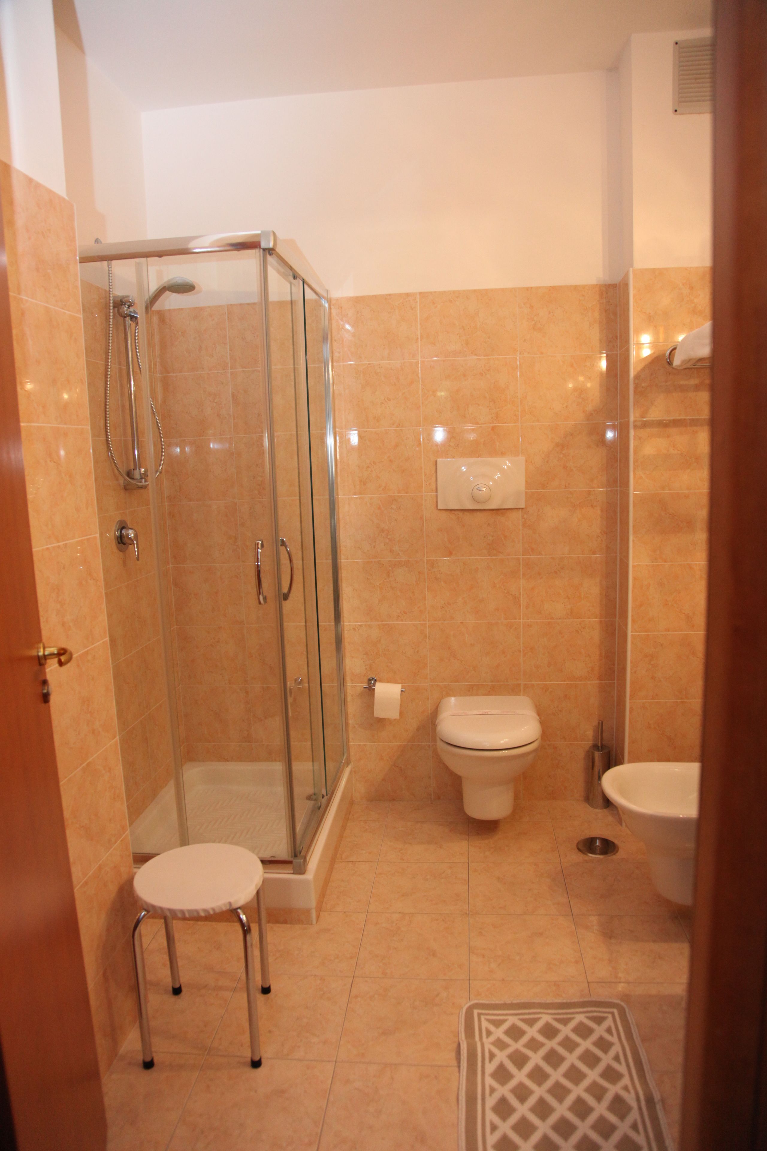 standard triple room | bathroom | hair dryer, bidet, towels
