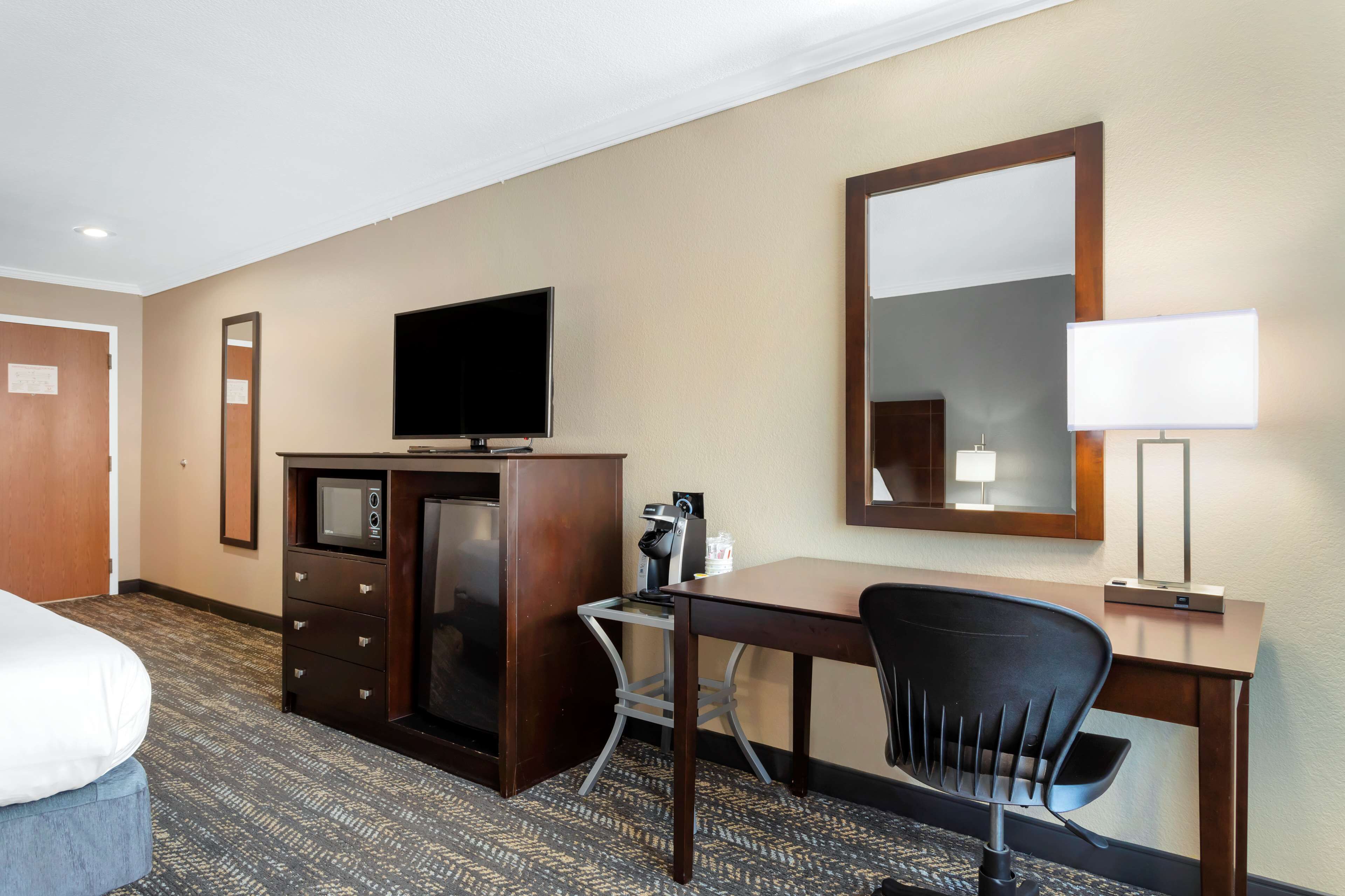 executive room, 1 king bed, non smoking, refrigerator & microwave (oversized room) | premium bedding, desk, laptop workspace, blackout curtains