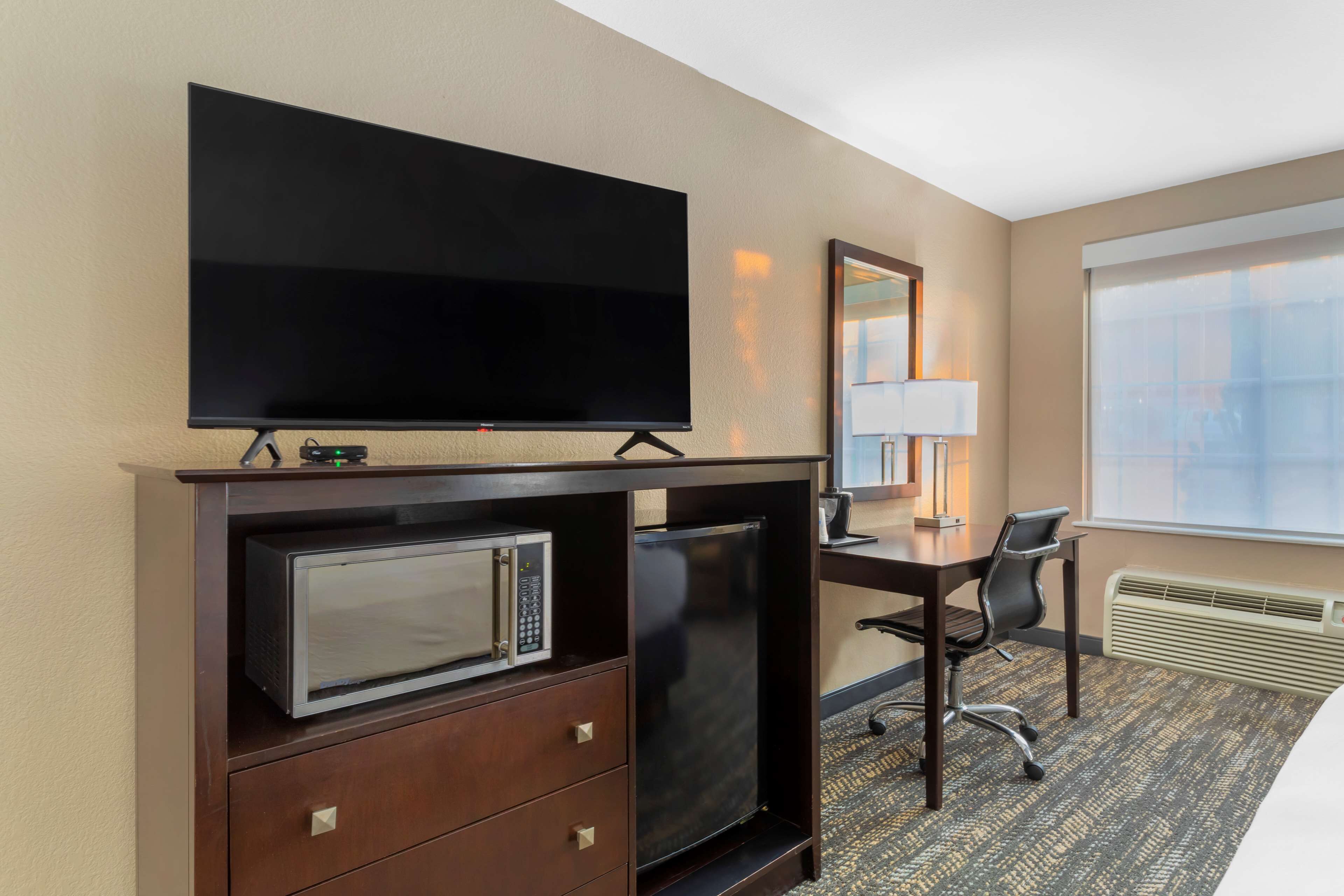 premium bedding, desk, laptop workspace, blackout curtains