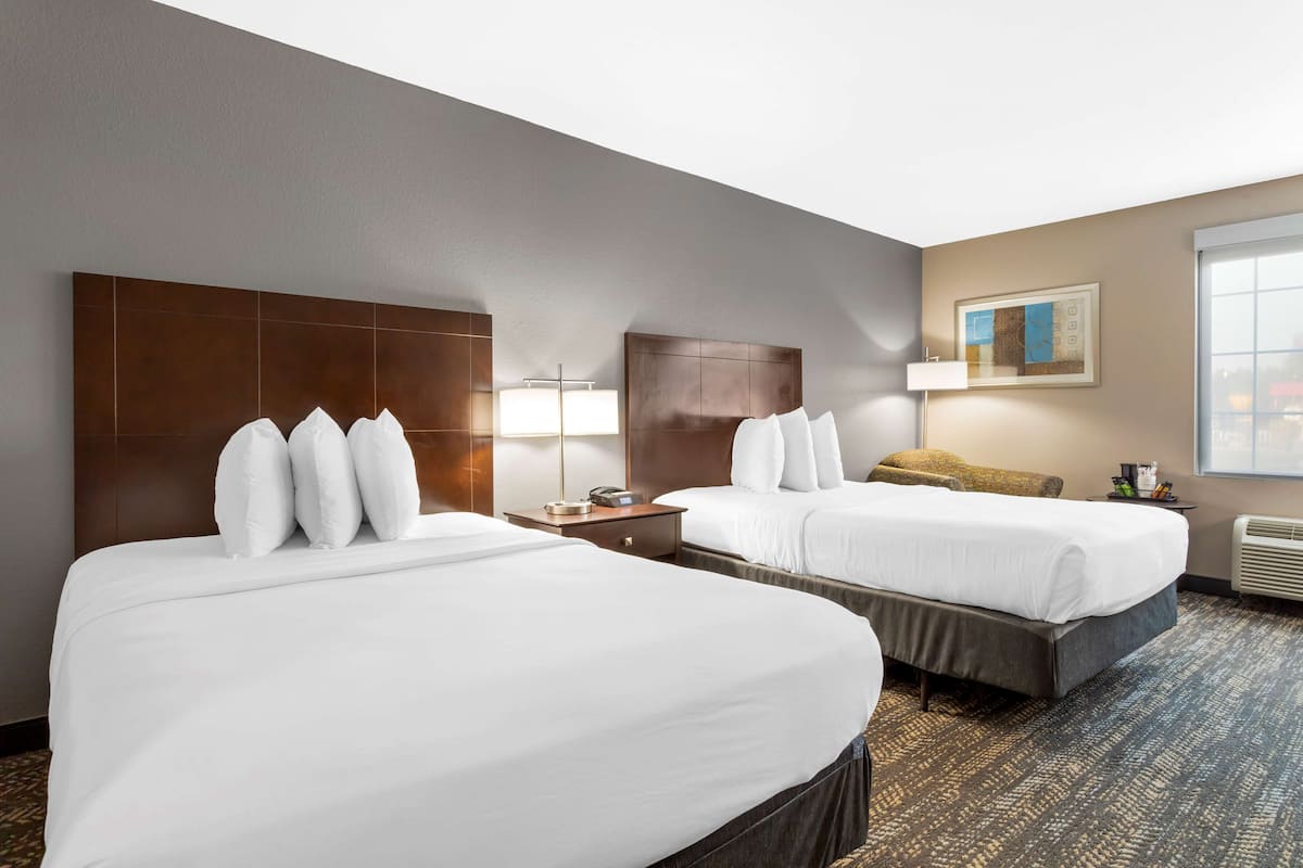 premium bedding, desk, laptop workspace, blackout curtains