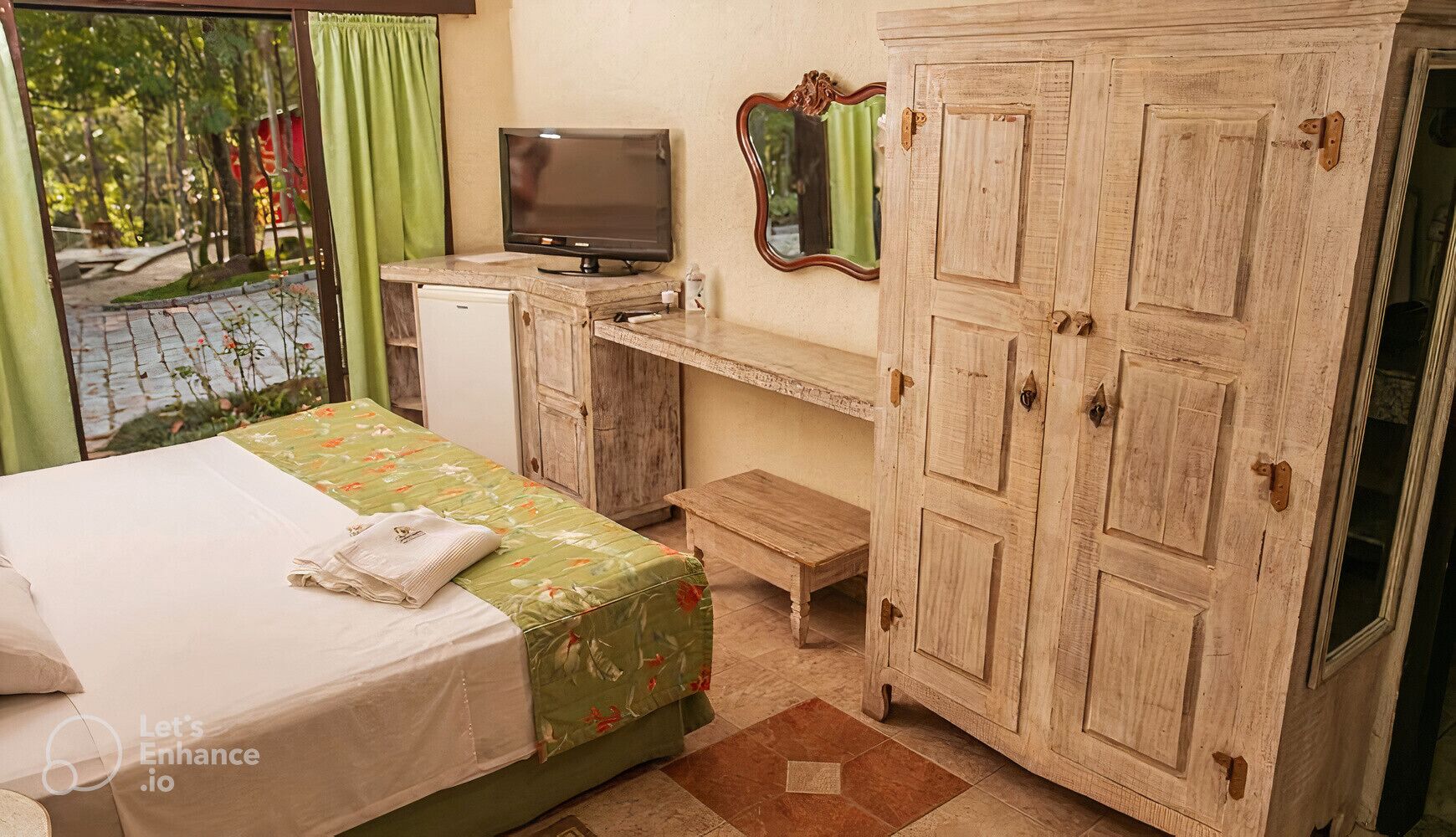 family room | 1 bedroom, minibar, in-room safe, desk