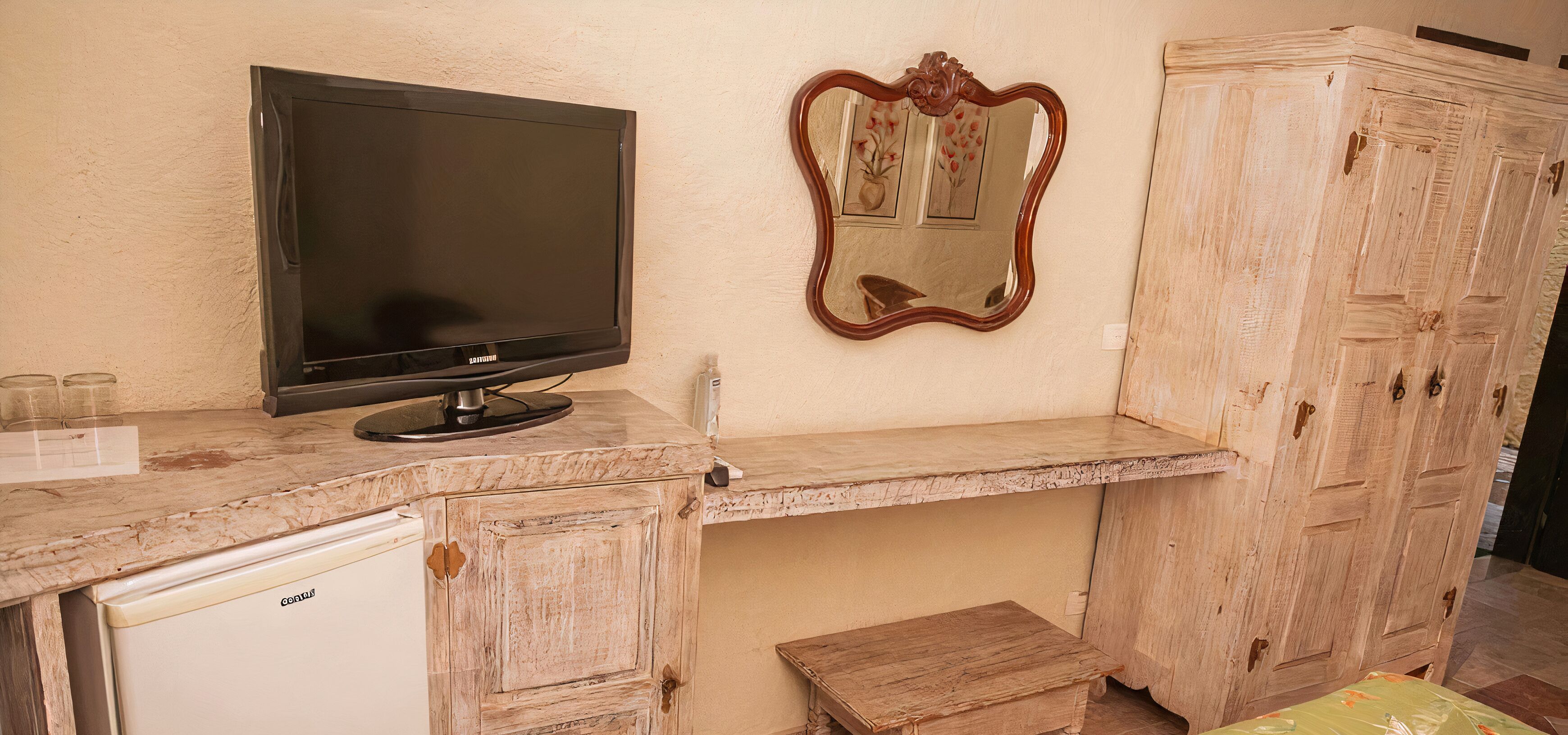 family room | 1 bedroom, minibar, in-room safe, desk