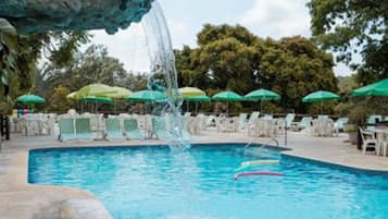 Indoor pool, pool umbrellas, pool loungers