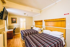 Individually decorated, blackout curtains, free WiFi, bed sheets - The Rex Hotel (Toronto)