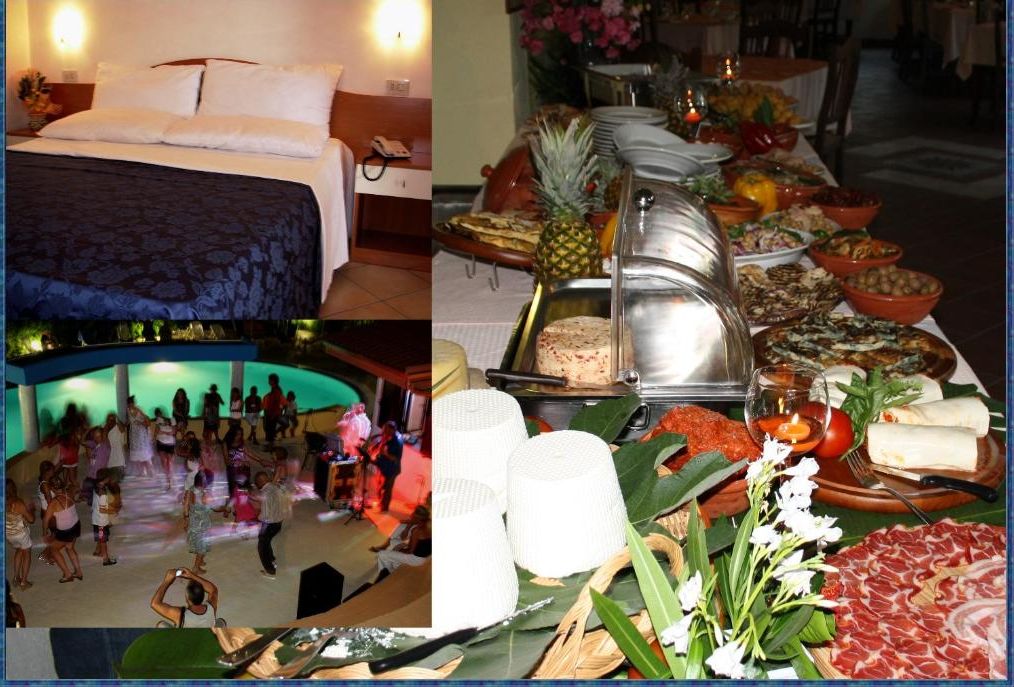 A hotel room with a bed and a nightstand, a buffet with various food items, and a dance floor with people.