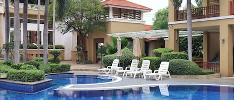 Outdoor pool, pool umbrellas, pool loungers