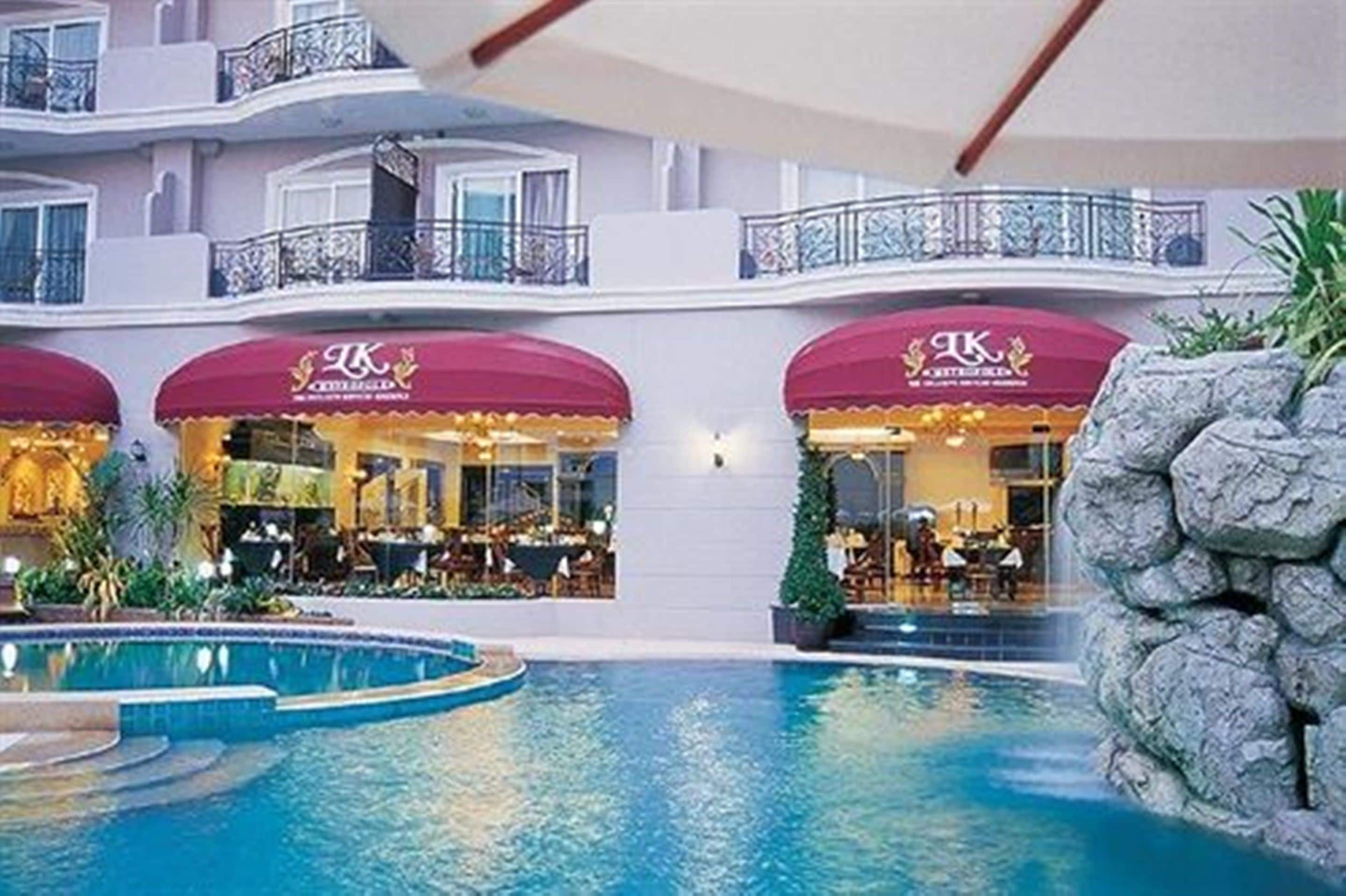 Outdoor pool, pool umbrellas, pool loungers