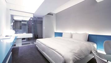 Deluxe Room, 1 King Bed | Premium bedding, minibar, in-room safe, individually decorated