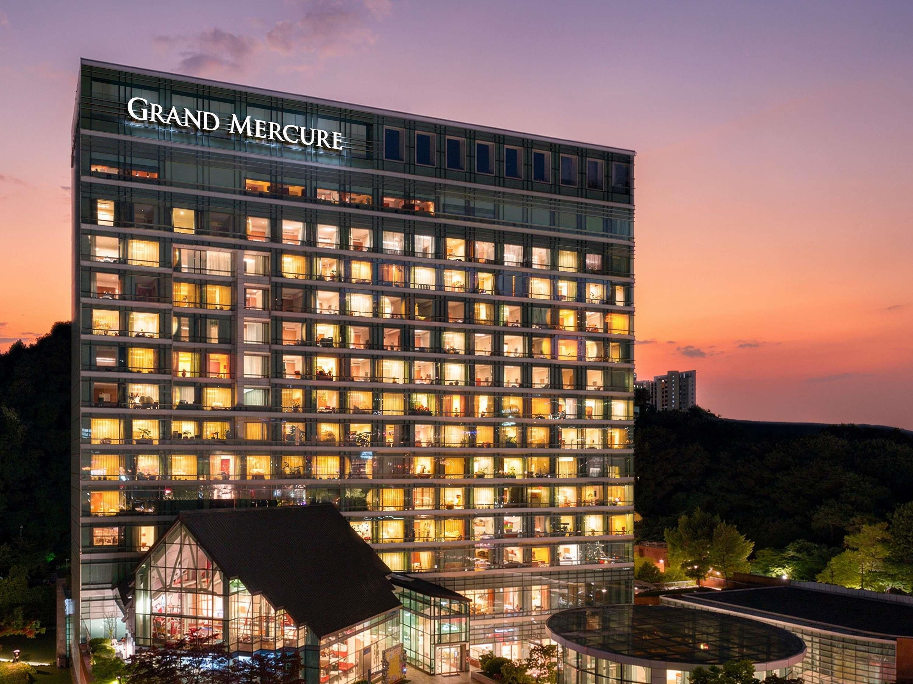 A multi-story hotel with a prominent 'Grand Mercure' sign at the top.