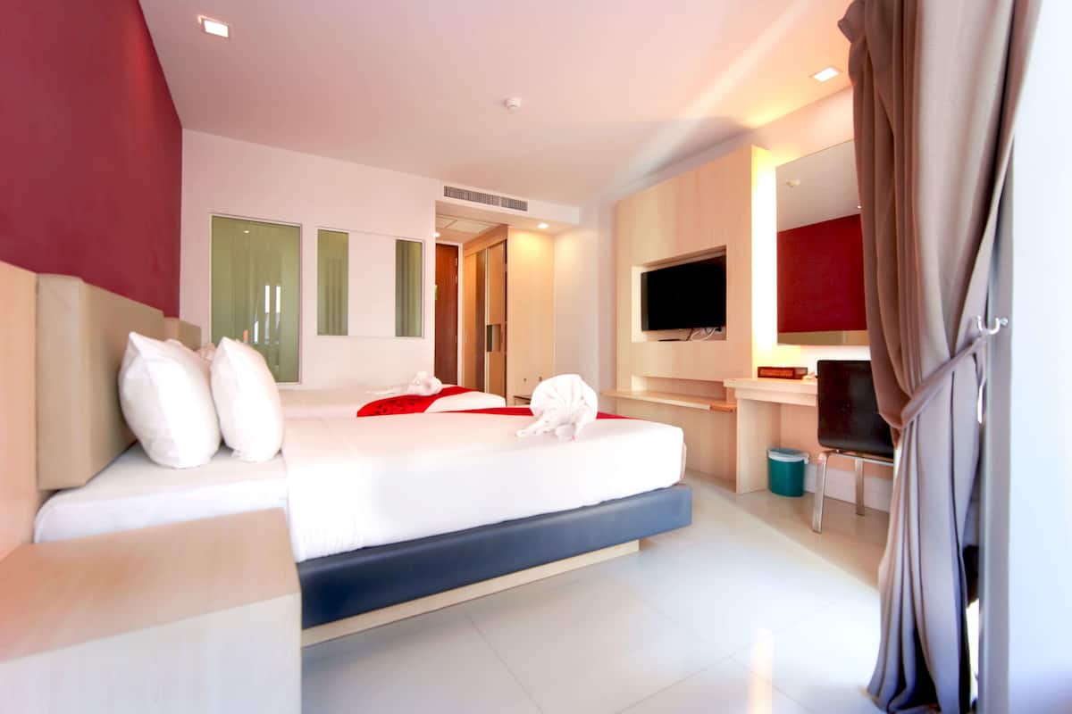 Premium bedding, in-room safe, desk, iron/ironing board (on request)