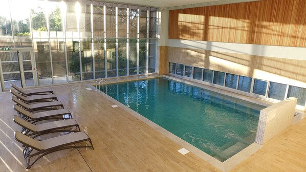 Indoor pool, outdoor pool, pool umbrellas, sun loungers