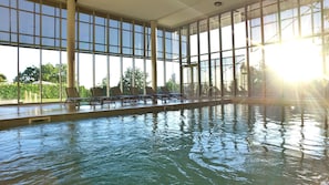 Indoor pool, outdoor pool, pool umbrellas, sun loungers